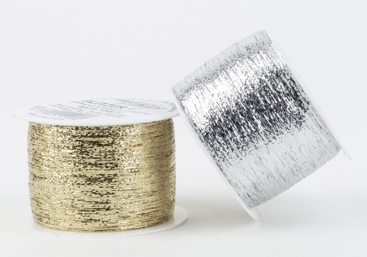 Wolly Hugs Glitter, 62% Polyester, 38% Polyamide  1000 m Wolly Hugs Glitter, 62% Polyester, 38% Polyamide  1000 m